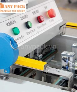 May dong goi tui niem phong APD-40B